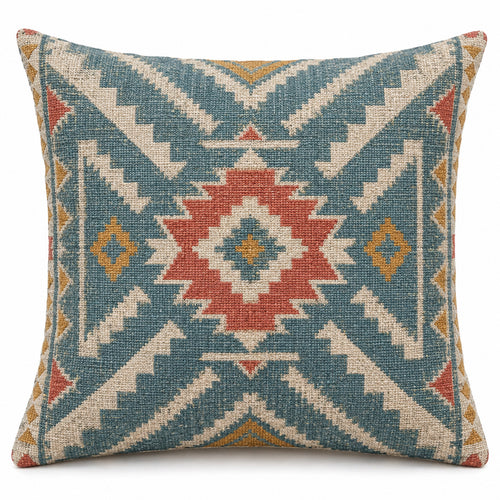 Geometric kilim-style cushion cover with aqua blue, coral and cream diamond motifs