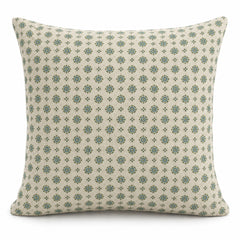 Cream square cushion cover with small repeating sage green decorative motifs