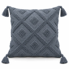 Slate blue square cushion cover with raised diamond pattern and matching corner tassels