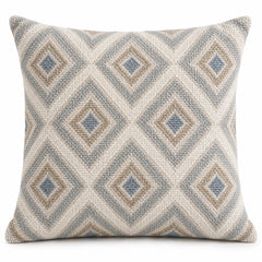Ivory square cushion cover with repeating nested diamond outlines in soft blue and beige