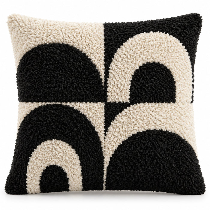 Black and ivory square cushion cover with bold shaggy-looking textured arch and semicircle motifs