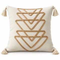 Ivory square cushion with layered mustard tan triangle motifs and tassels at the corners
