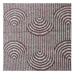 Patterned rug with concentric circle design in purple and white on a white background