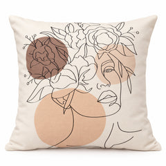 Cream square cushion with abstract black face line drawing and peach beige floral artwork