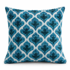 Turquoise blue square cushion with repeated ornate ivory ogee and floral motifs