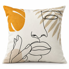 Ivory square cushion featuring minimalist black line art face with mustard leaf and neutral botanical shapes