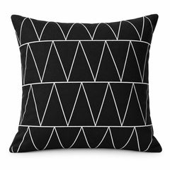 Black square cushion with white fine-line abstract triangles and connected geometric line pattern