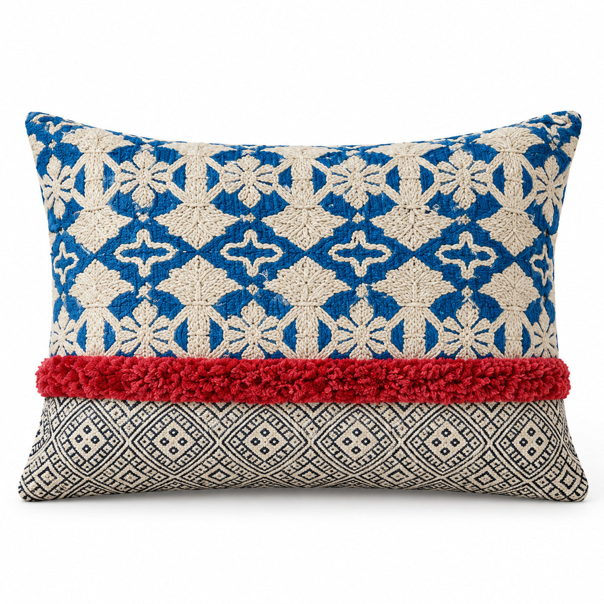 Blue and ivory square cushion with repeating ornamental geometric motifs and contrasting rust red lower border