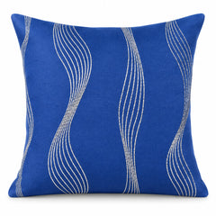 Cobalt blue square cushion with elegant flowing ivory thin wavy vertical lines