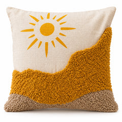 Ivory square cushion with bright mustard sun artwork and warm golden raised-looking abstract hillside