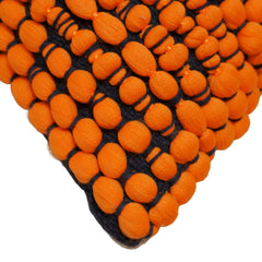 Orange pom pom textured handwoven cotton polyester cushion cover 35x50 cm