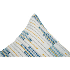 Folded fabric with blue and yellow pattern on a white background