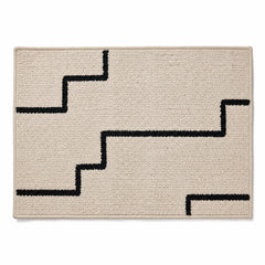 Beige rectangular placemat with black stepped line geometric pattern, modern textured dining table mat by Primeval