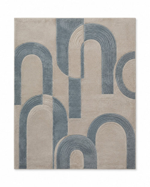 Beige and dusty blue layered arch geometric area rug for wholesale sourcing from India