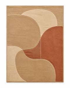 Camel and terracotta area rug with overlapping abstract geometric color blocks