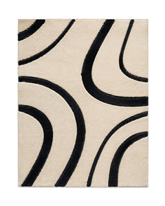 Cream and black curved line tufted area rug for wholesale sourcing from India