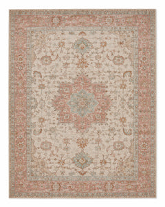 Faded decorative area rug with dusty rose border and medallion, muted aqua floral accents, rust details and beige field