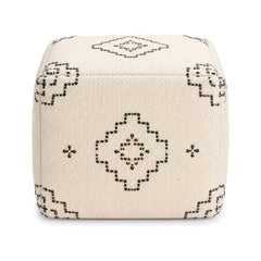 Ivory and black geometric embroidered cube pouf ottoman on white background