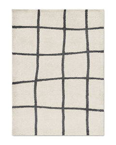Ivory and charcoal irregular hand-drawn grid rug for wholesale sourcing from India