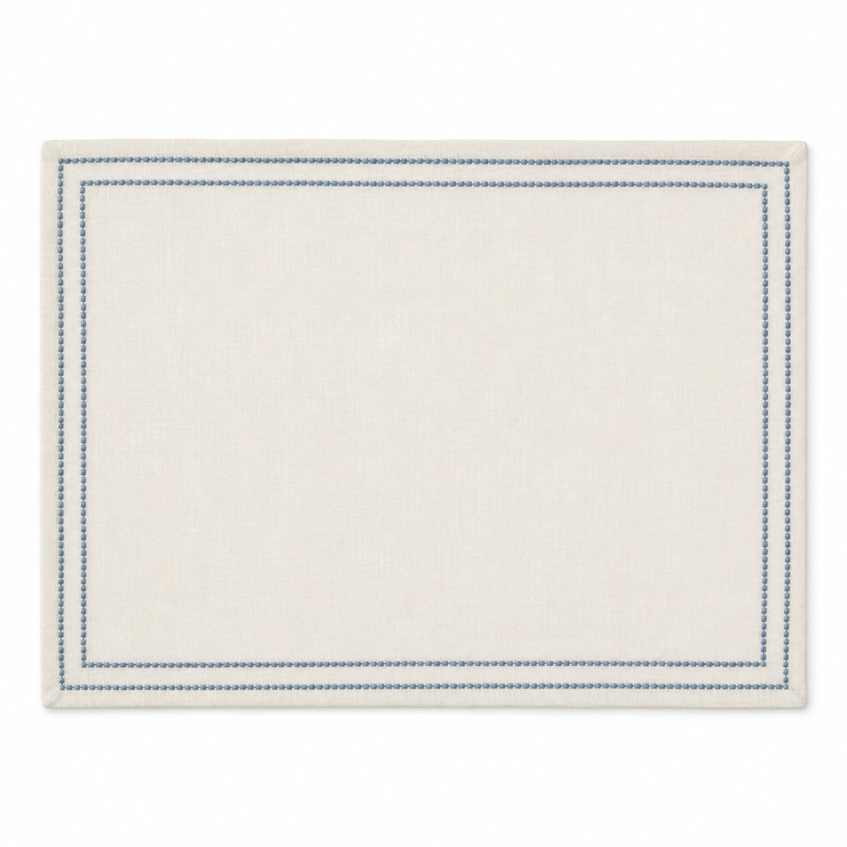Ivory woven placemat with dusty blue double-line border, tailored rectangular dining table mat by Primeval
