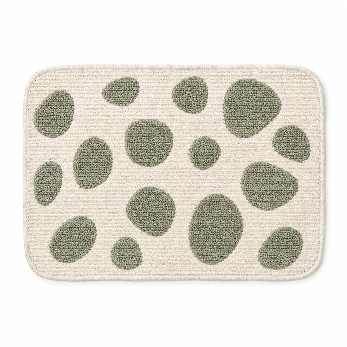 Ivory rounded placemat with sage green organic pebble motifs, contemporary textured dining table mat by Primeval
