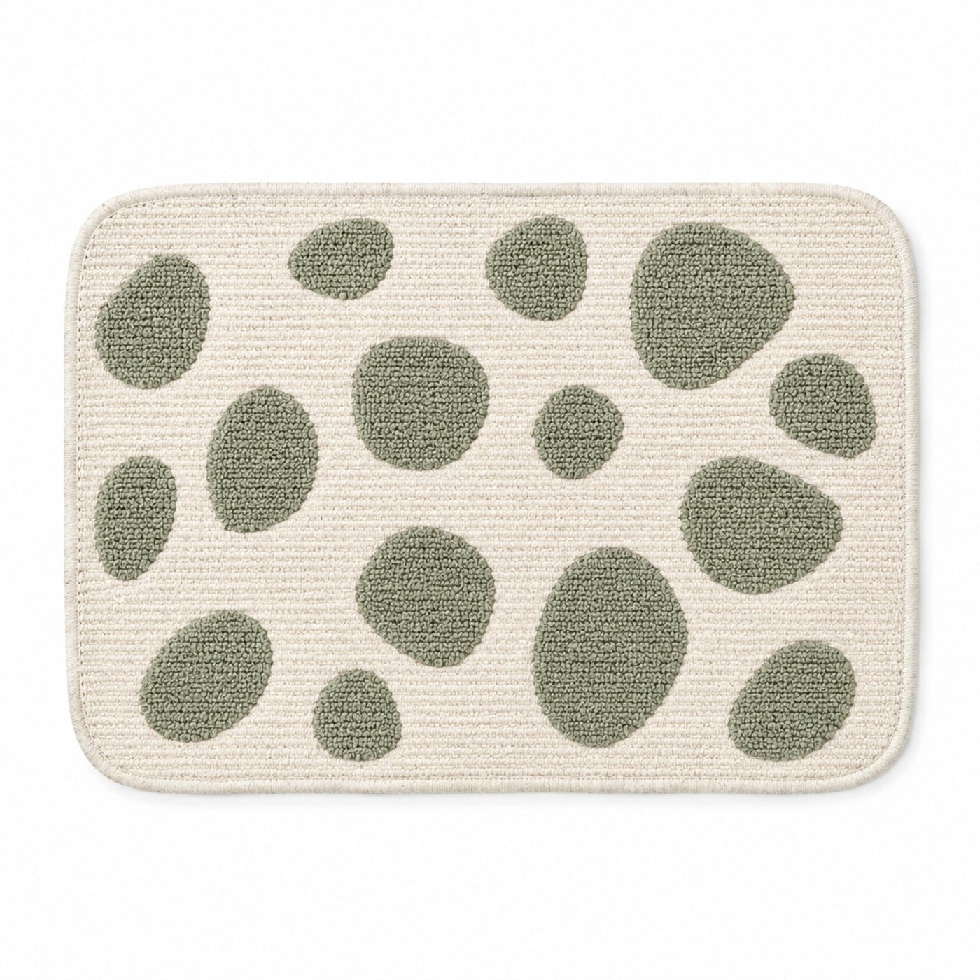 Ivory rounded placemat with sage green organic pebble motifs, contemporary textured dining table mat by Primeval