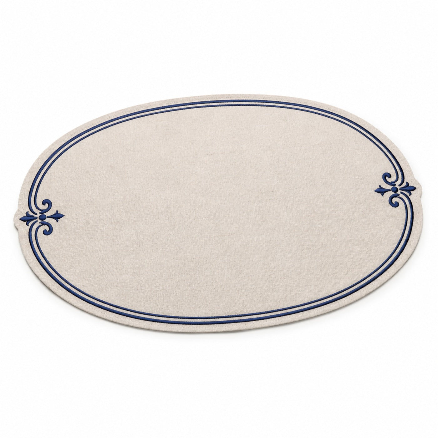Oval ivory placemat with navy double border and ornamental side flourishes, elegant dining table mat by Primeval