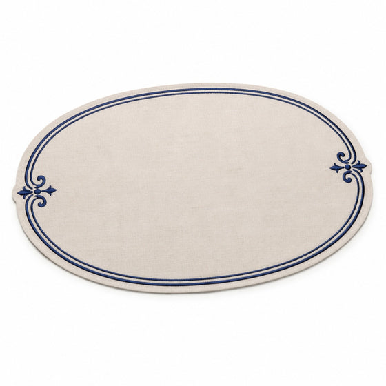 Oval ivory placemat with navy double border and ornamental side flourishes, elegant dining table mat by Primeval