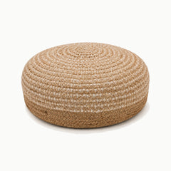 24 inch low round natural jute pouf with subtle ivory woven texture