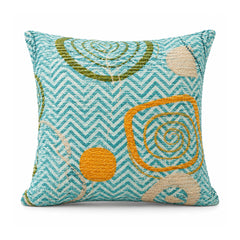 Primeval aqua blue cushion cover with fine chevrons and ochre mustard, pink and teal concentric circular swirls