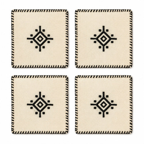 Beige black geometric coaster set on a clean white background