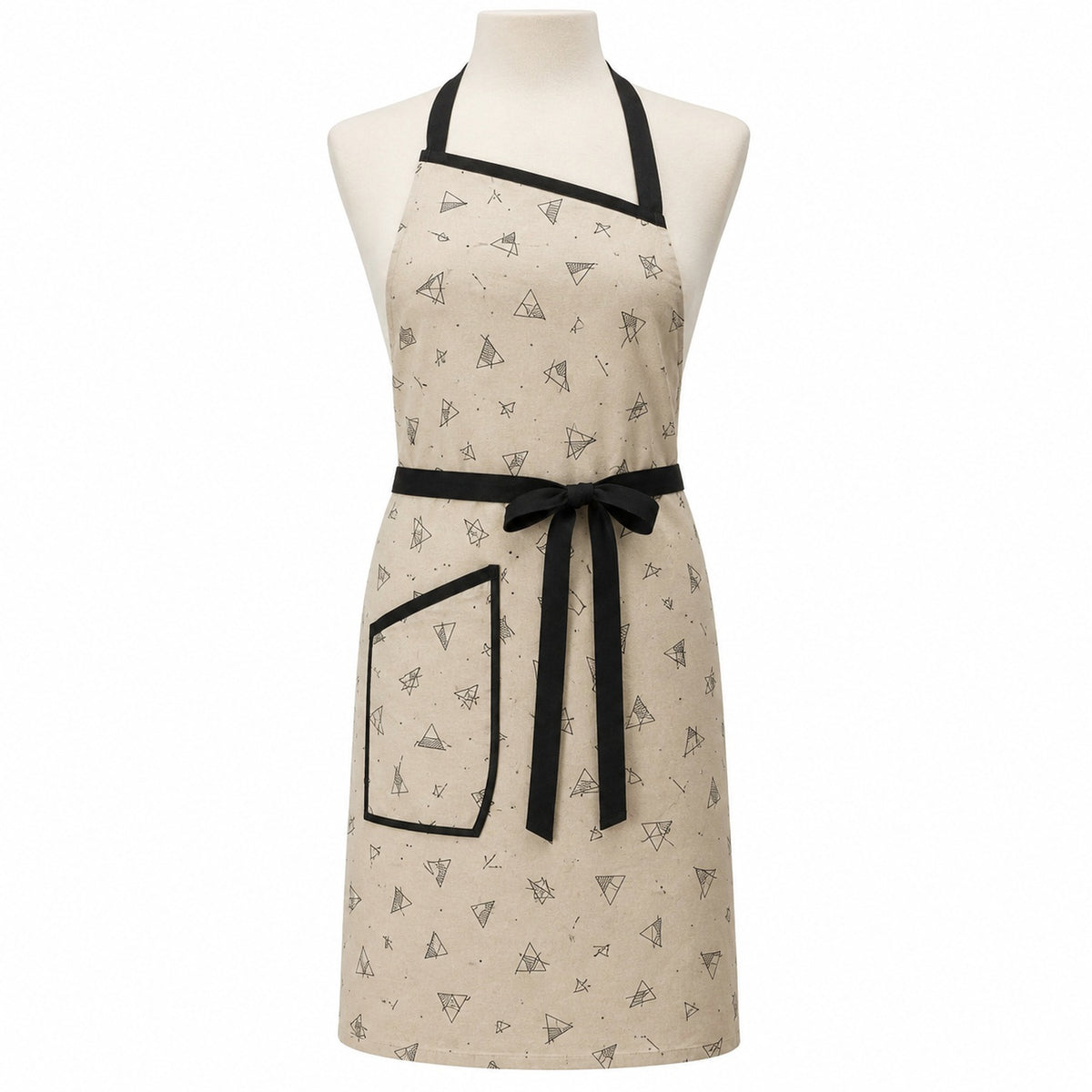 Primeval beige chef apron with black geometric print displayed on a dress form