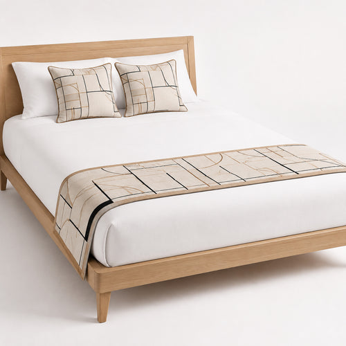 Beige bed runner with black linear border, styled on white bedding for wholesale hotel and private-label bedroom sourcing
