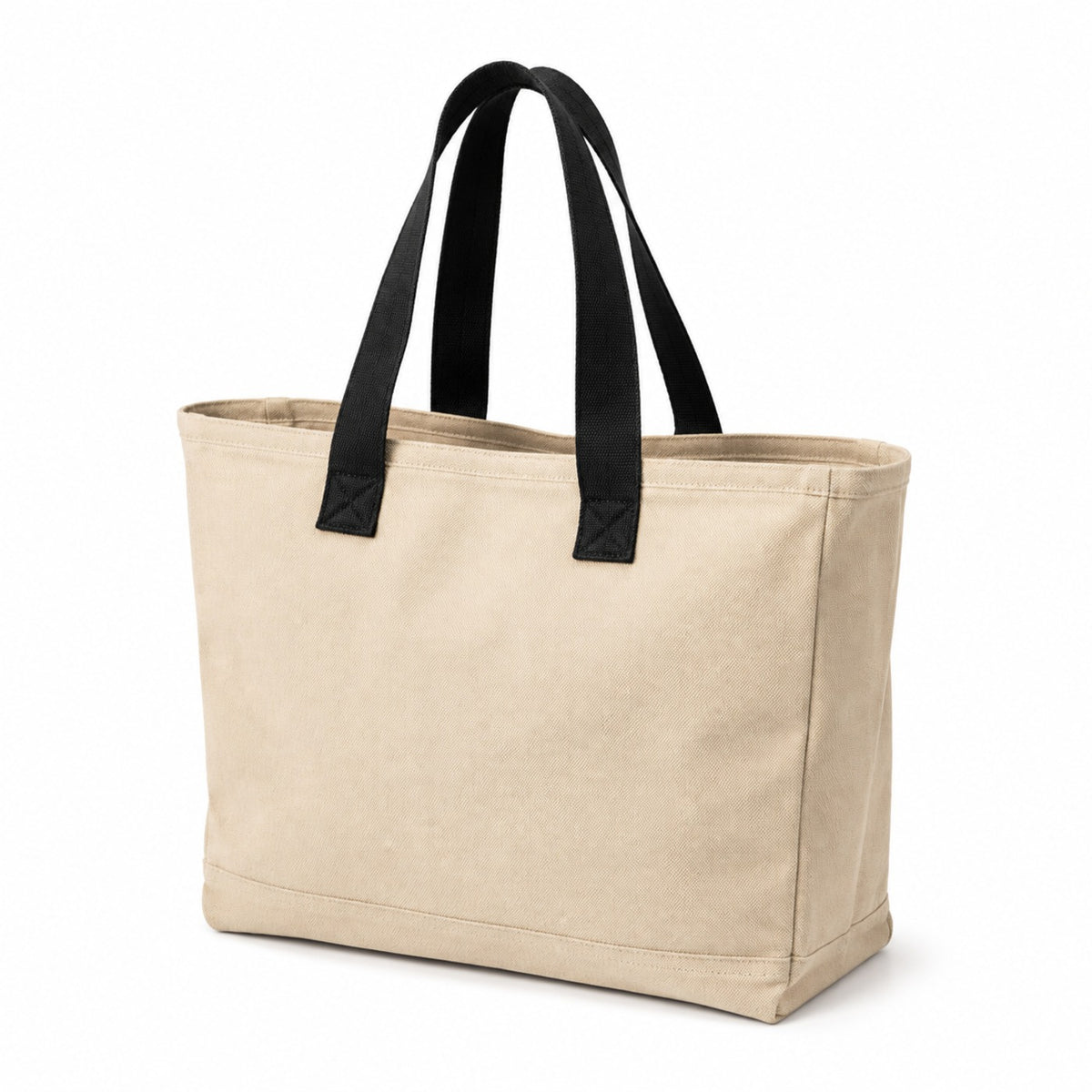 Beige canvas tote bag with contrasting black handles and a wide gusset on a white background.