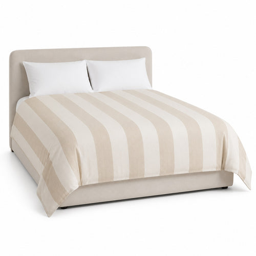 Primeval beige cream broad stripe duvet cover displayed on a styled bed against a clean white studio background