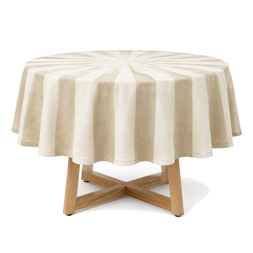 Primeval beige cream broad stripe tablecloth displayed on a round dining table