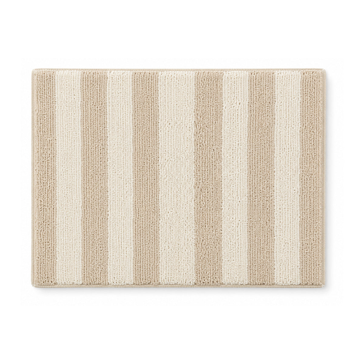 Beige and cream striped plush bath mat on white background