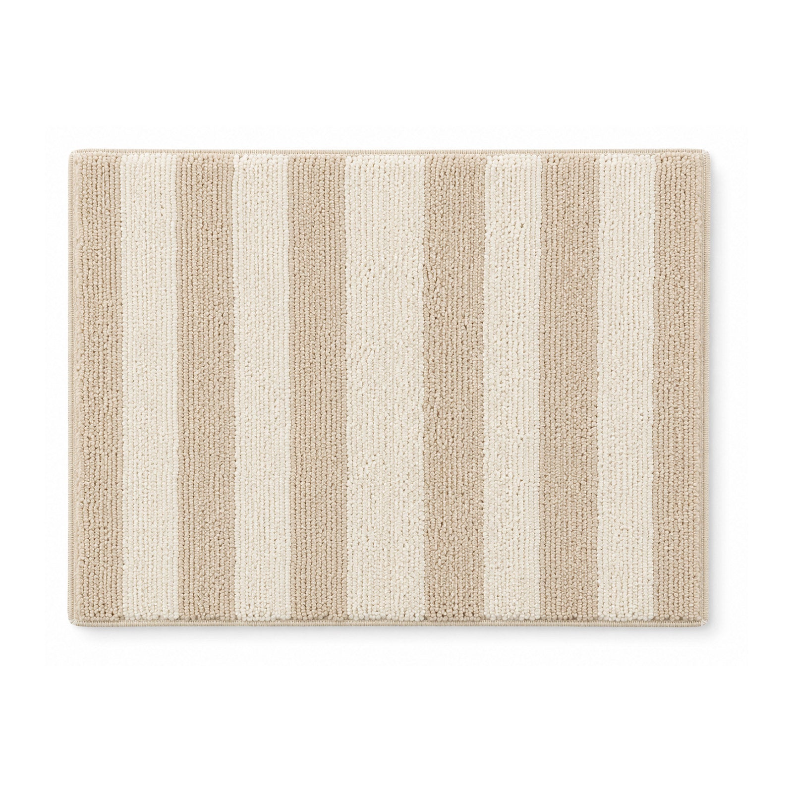 Beige and cream striped plush bath mat on white background
