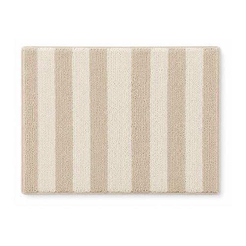 Beige and cream striped plush bath mat on white background