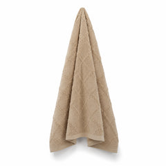 Beige diamond tufted cotton bath towel 70x140 cm on white background