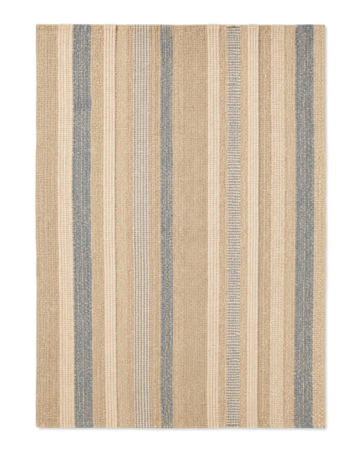 Beige and dusty blue handwoven area rug with varied artisan-style vertical stripes on a white background.