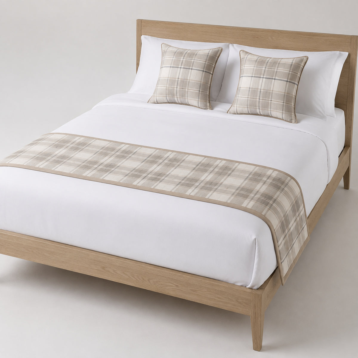 Beige and grey plaid bed runner styled on white bedding for wholesale hotel, hospitality and private-label bedroom sourcing