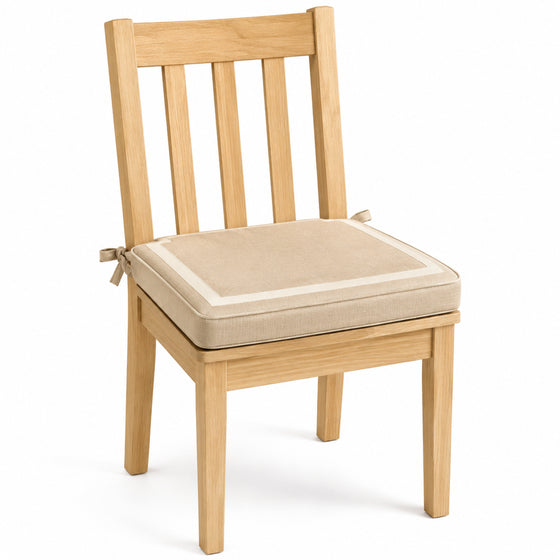 Primeval beige and ivory border dining chair pad with tie straps on wooden dining chair