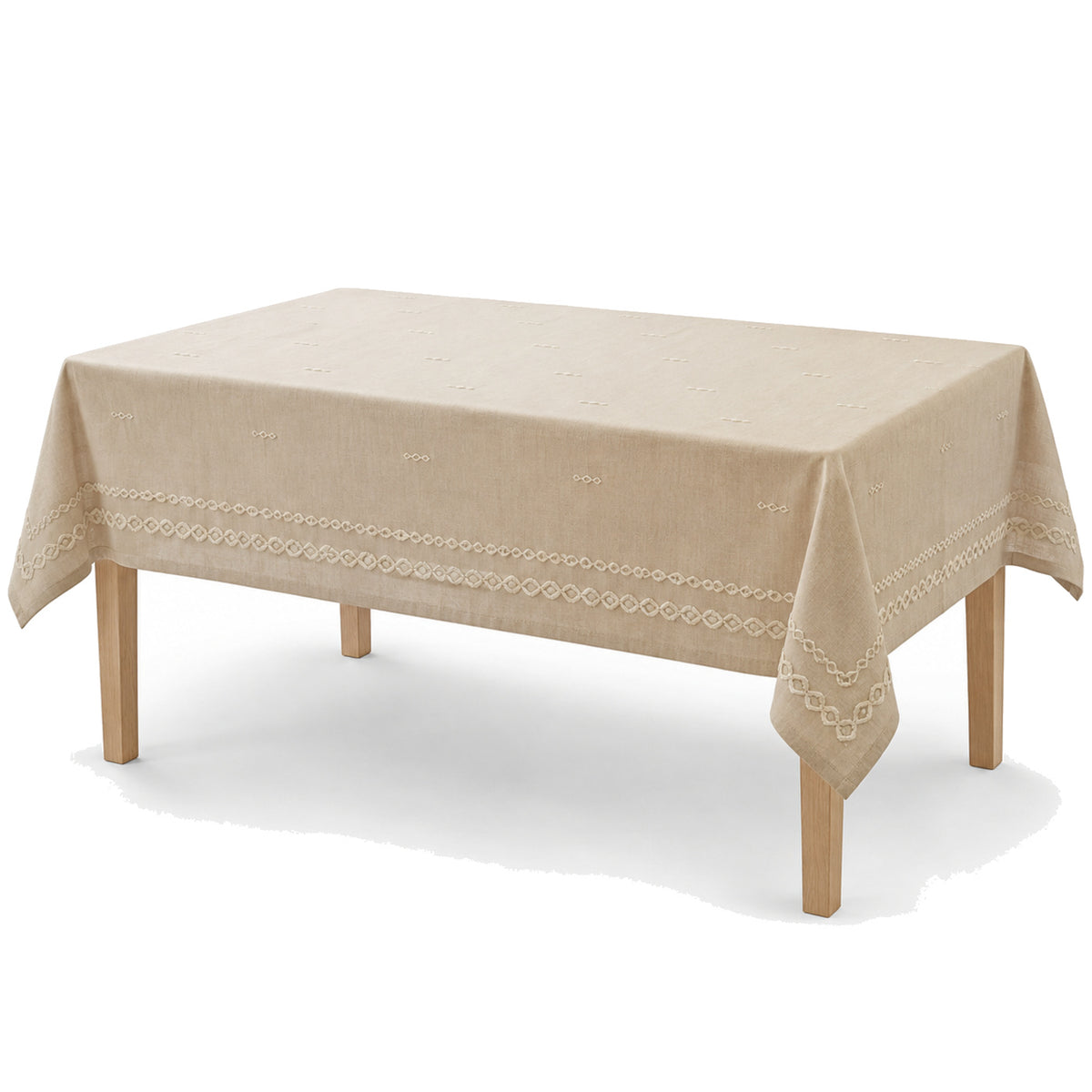 Primeval beige ivory chain stitch embroidery tablecloth displayed on a rectangular dining table