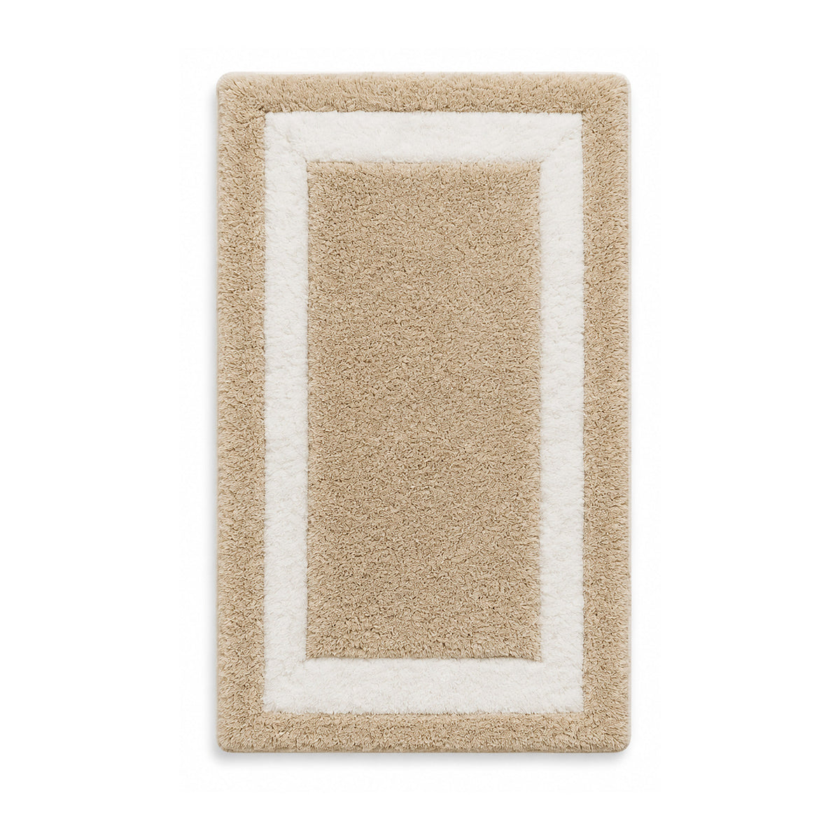 Beige and ivory framed plush bath mat on white background