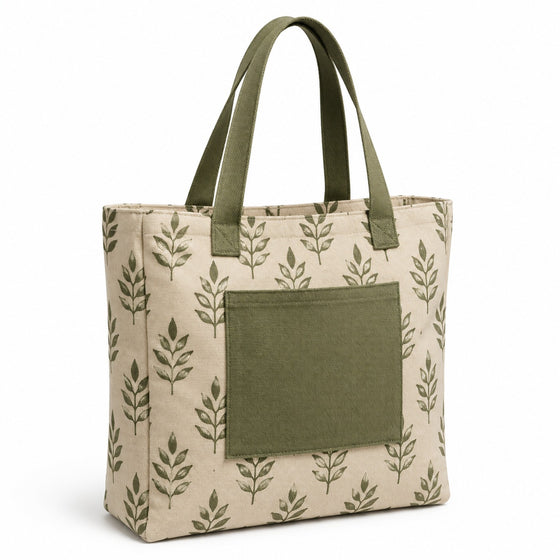 Beige botanical print tote bag with olive leaf motifs, olive handles and a large front pocket on a white background.