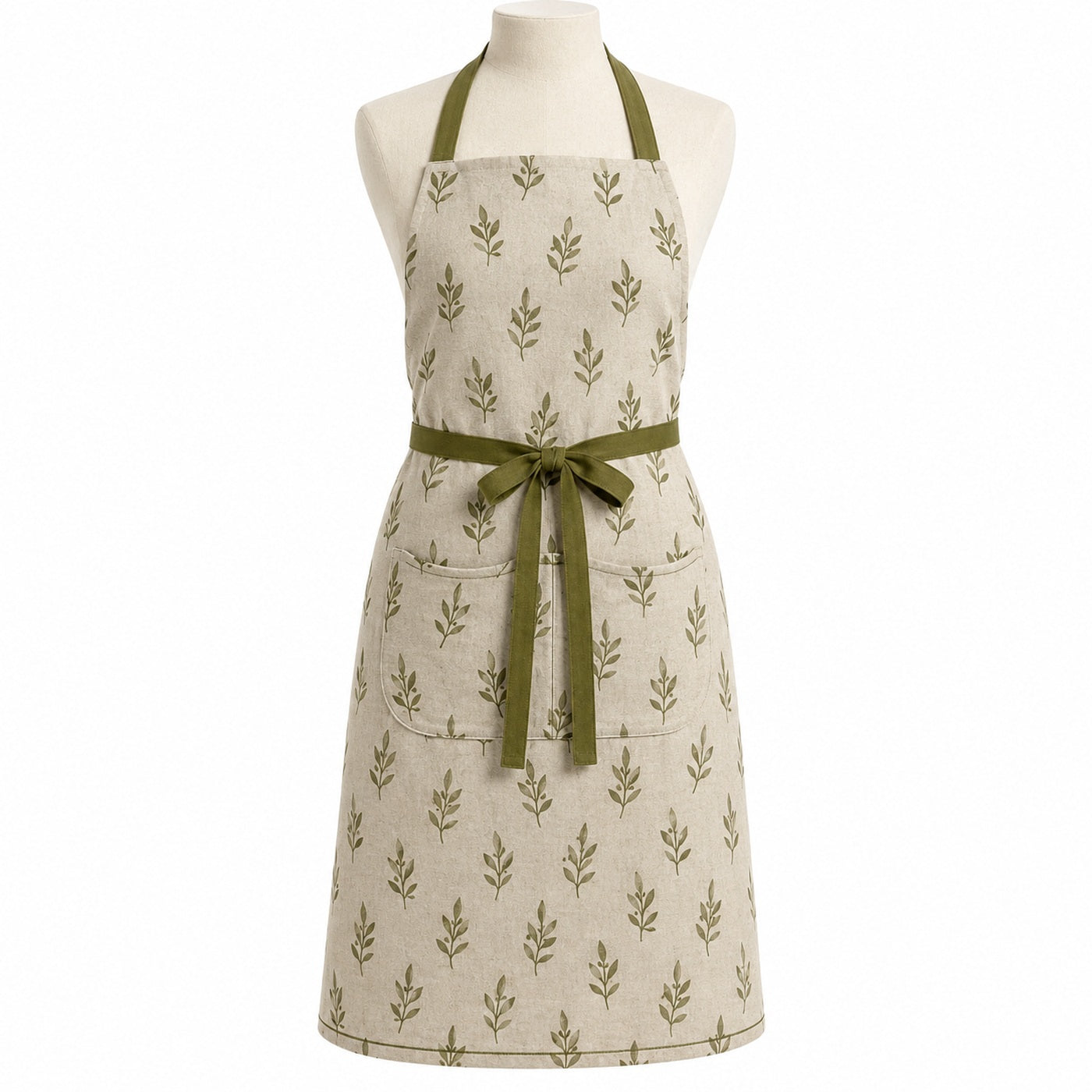Primeval beige chef apron with olive leaf print displayed on a dress form