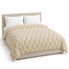 Primeval beige sage small botanical duvet cover displayed on a styled bed against a clean white studio background