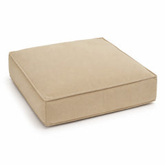 Beige square floor cushion with piped edge on white background