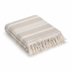 Beige striped fringed cotton hammam towel 90x180 cm on white background